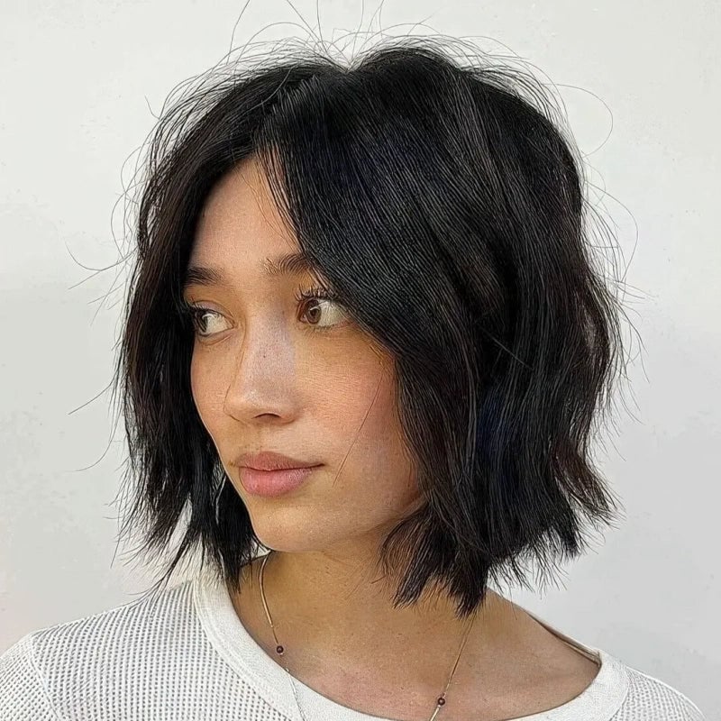 Effortless Black Wavy Collarbone Bob, Close-Up Take — Classy Hair Trends for Women