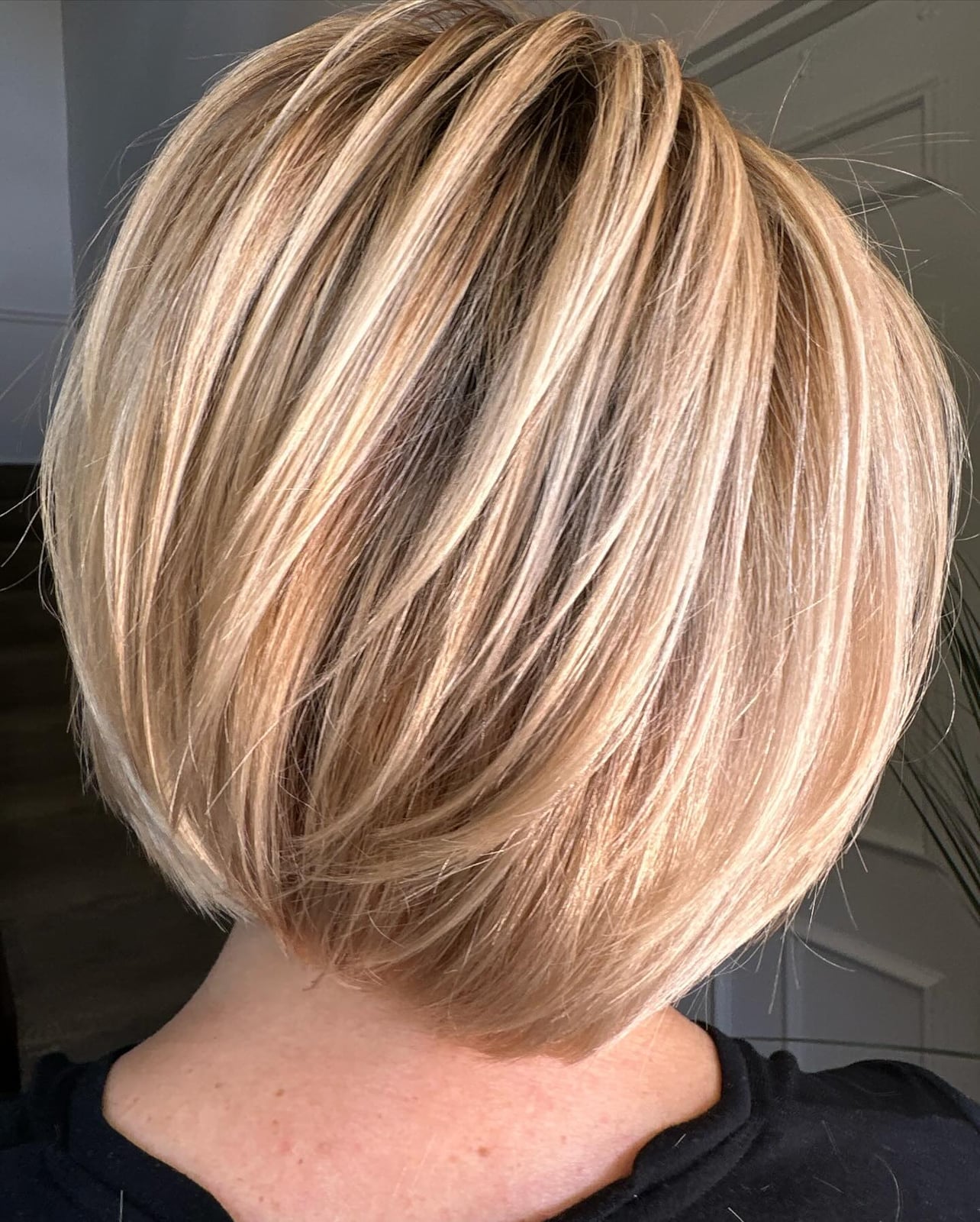 Blonde Layered Bob With Stacked Back — Classy Haircuts for Round Face