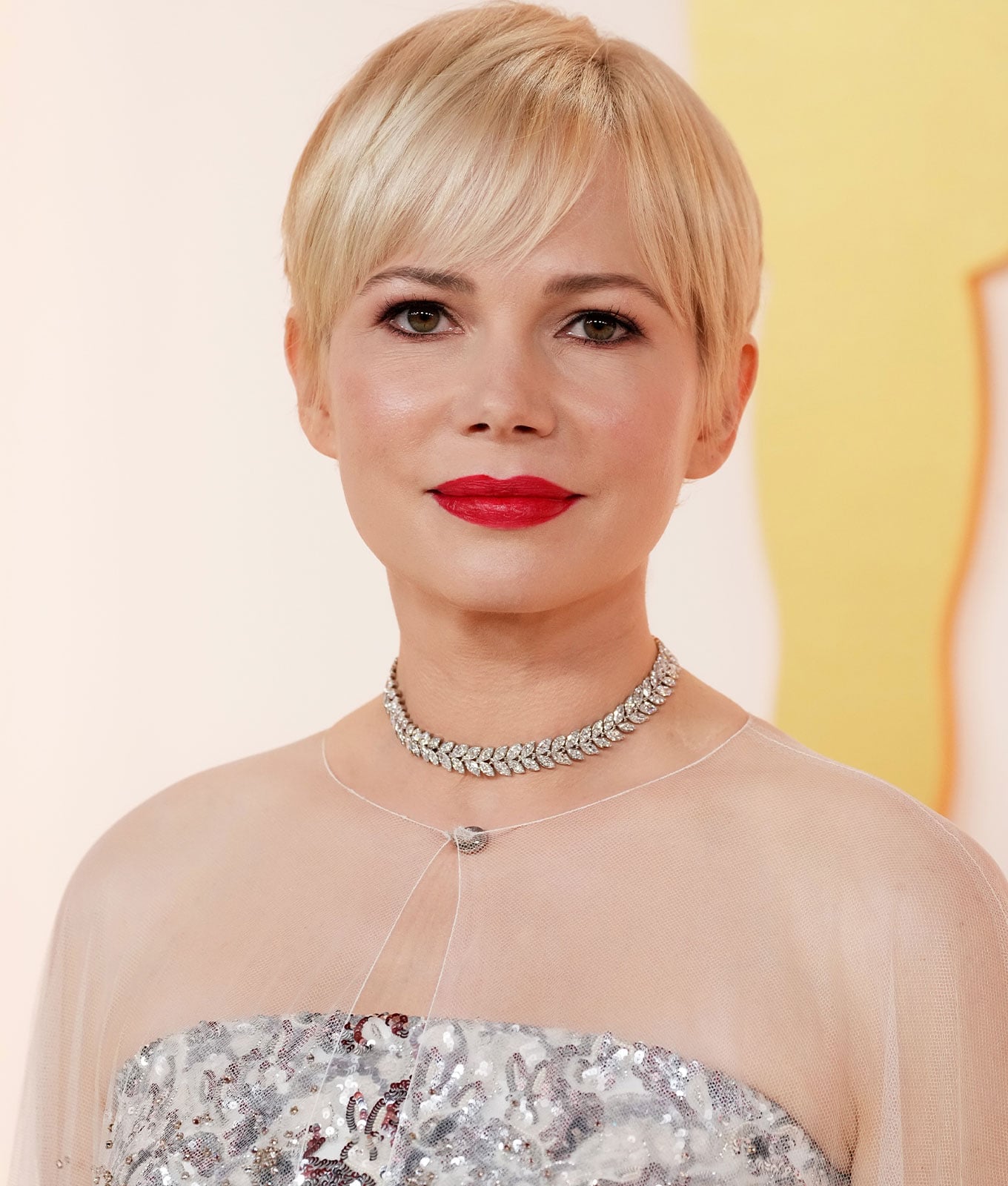 Ash Blonde Pixie With Textured Side Bangs — Classy Haircuts for Round Face