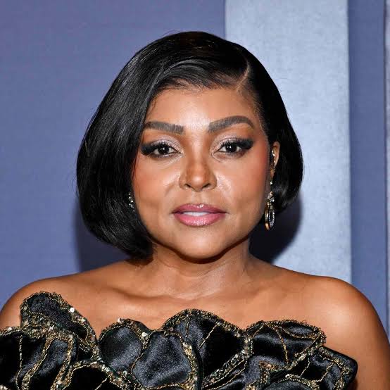 Black Angled Bob With Side Swept Bangs, Close-Up Take — Classy Haircuts for Round Face