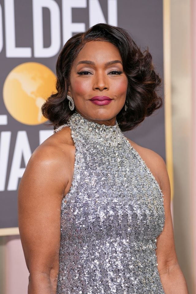 Wavy Chin Length Bob With Side Swept Bangs — Classy Haircuts for Women over 50