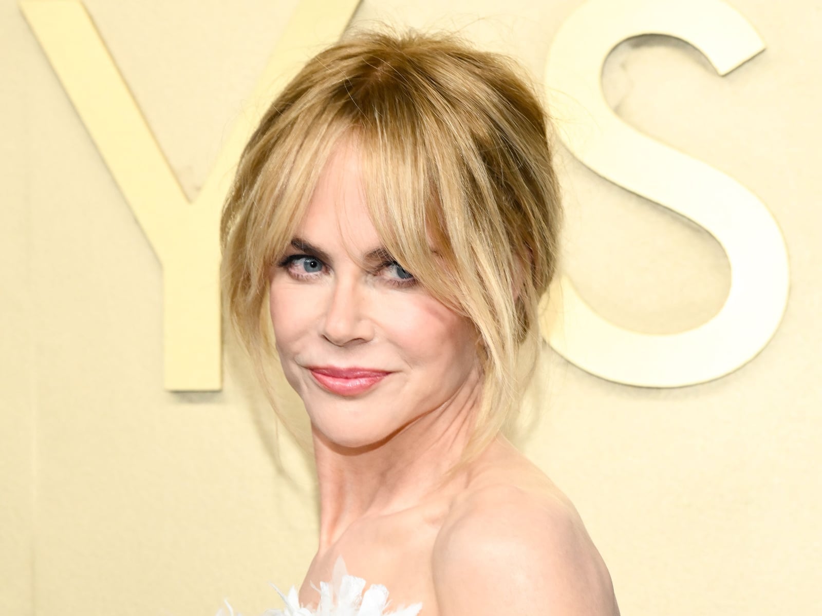 Collarbone Blonde With Curtain Bangs, Wavy — Classy Hairstyles for Women over 50