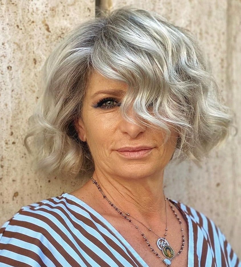 Silver Bob With Darker Roots And Side-Swept Bangs — Classy Hairstyles for Women over 50