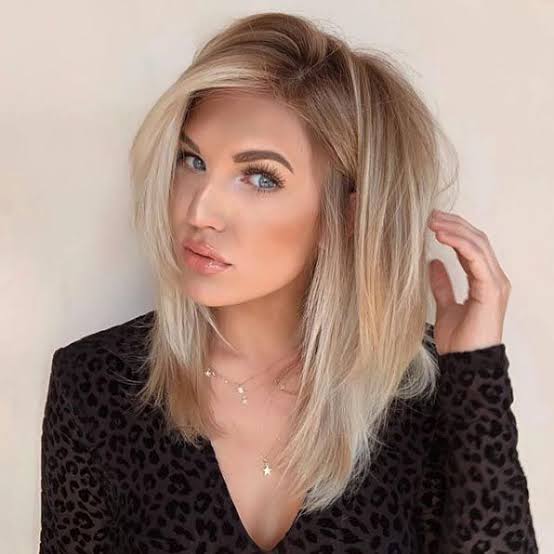 Textured Black Top With Layered Haircut And Star Necklace Textured Black Top With Layered Haircut And Star Necklace — Classy Hush Cut