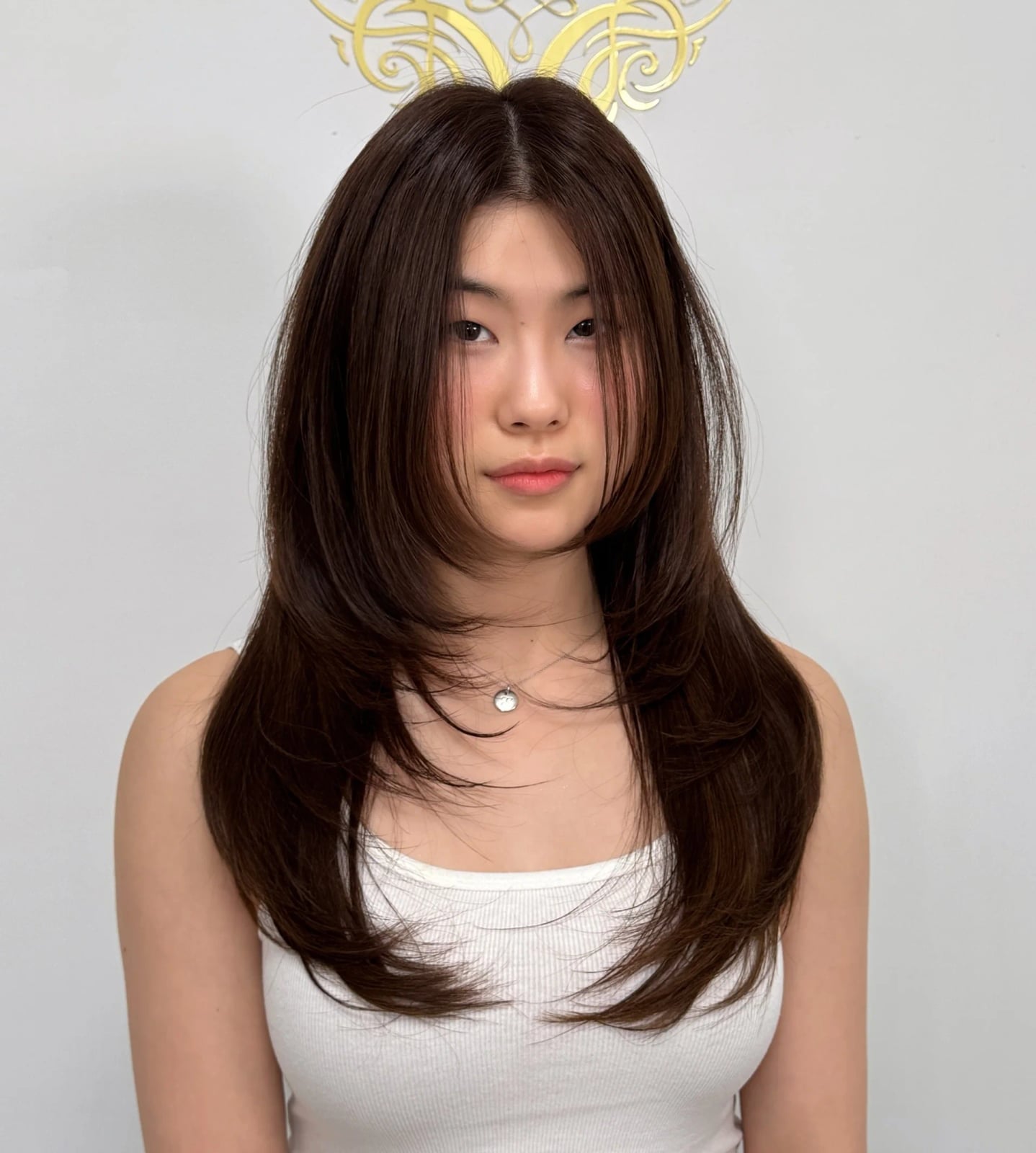 Layered Hair With White Tank Top And Necklace Layered Hair With White Tank Top And Necklace — Classy Hush Cut