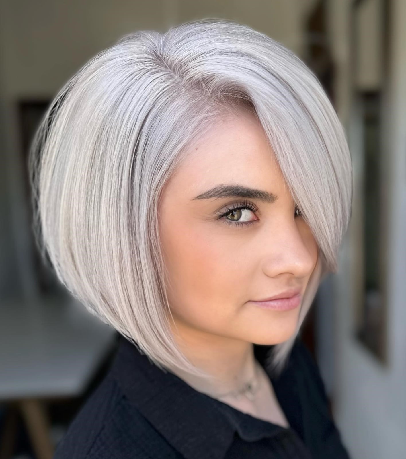 Sleek Ash Blonde Bob With Side Swept Fringe Sleek Ash Blonde Bob With Side Swept Fringe — Classy Inverted Bob