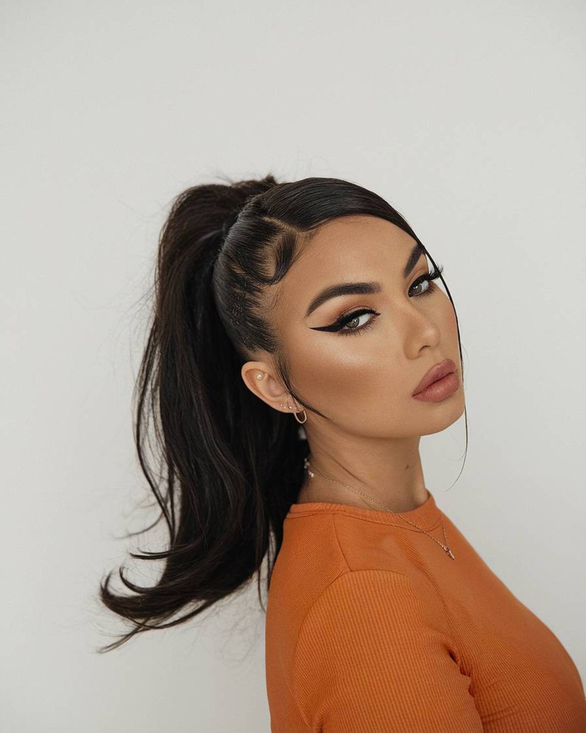 Sleek High Ponytail With Wispy Tendrils — Classy Latina Hairstyles