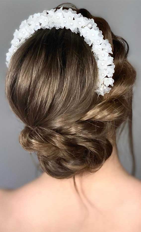Low Bun With Flower Crown — Classy Latina Hairstyles