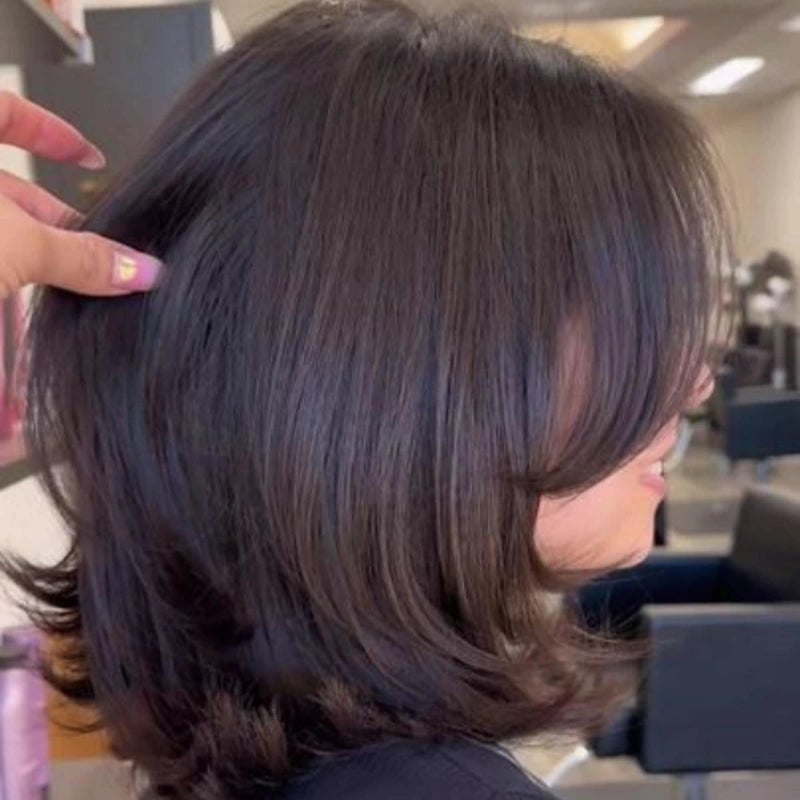 Collarbone Shag With Prominent Curtain Bangs Collarbone Shag With Prominent Curtain Bangs — Classy Layered Haircuts for Medium Hair