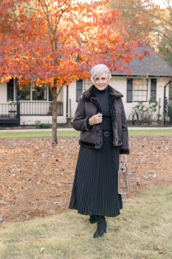 Faux Fur Jacket Over Green Turtleneck And Pleated Skirt Faux Fur Jacket Over Green Turtleneck And Pleated Skirt — Classy Layered Ideas