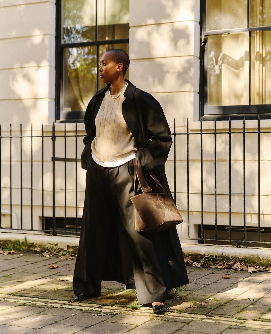 Oversized Black Coat Over Beige Knit And White Tee Oversized Black Coat Over Beige Knit And White Tee — Classy Layered Ideas