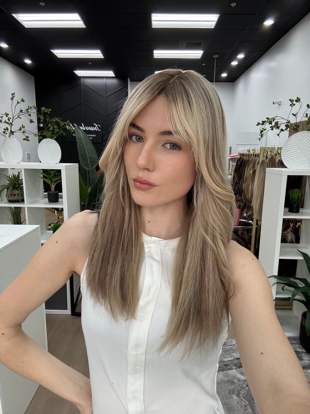 Ash Blonde Mid-Back Layers With Curtain Bangs, Close-Up Take Ash Blonde Mid-Back Layers With Curtain Bangs, Close-Up Take — Classy Layers Wig