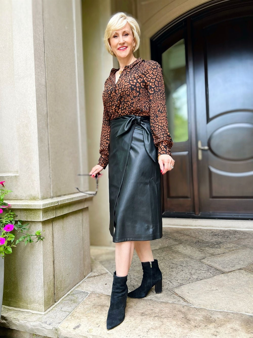 Black Leather Wrap Midi Skirt with a Leopard Blouse, Close-Up Take Black Leather Wrap Midi Skirt with a Leopard Blouse, Close-Up Take — Classy Leather Skirt Outfits