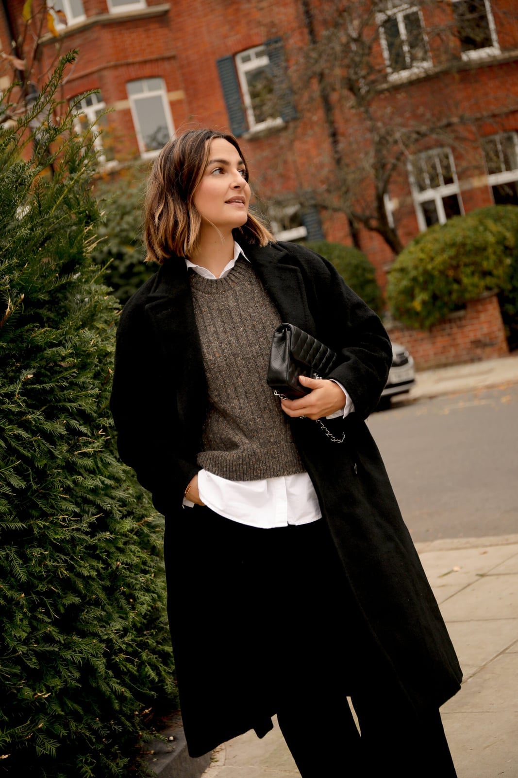 Black Long Coat Over Gray Knit And White Shirt Black Long Coat Over Gray Knit And White Shirt — Classy London Outfits