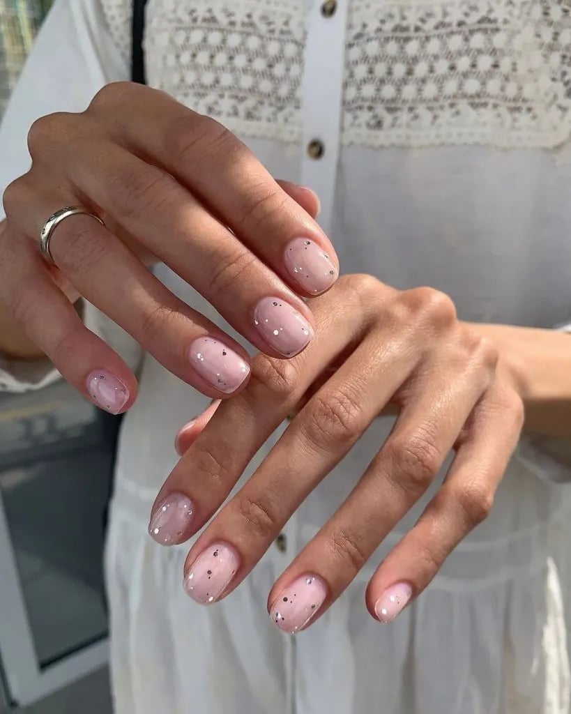 Sheer Pale Pink Glossy Short Oval With Glitter Dots Sheer Pale Pink Glossy Short Oval With Glitter Dots — Classy Looks Nail
