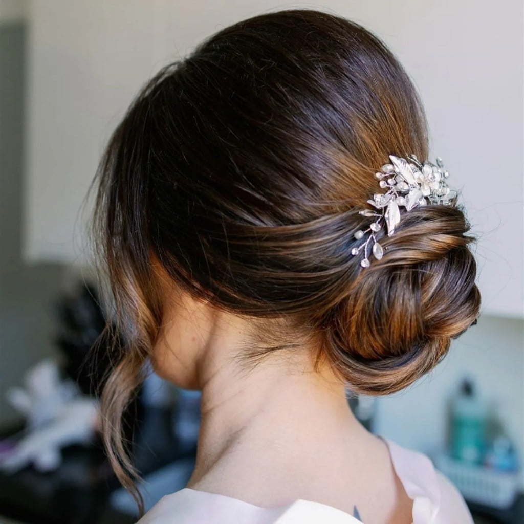 Dark Brown Textured Bun With Jeweled Accessory Dark Brown Textured Bun With Jeweled Accessory — Classy Loose Updo
