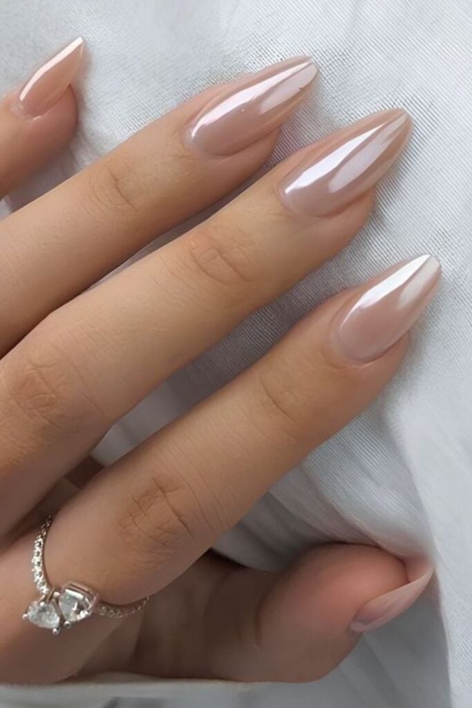 Pale Nude Pearlescent Chrome Stiletto Nails Pale Nude Pearlescent Chrome Stiletto Nails — Classy Nude Chrome Nails