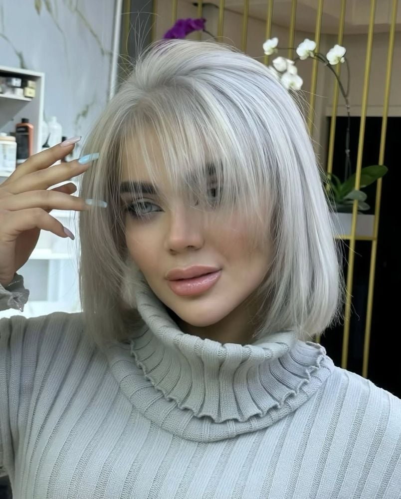 Chin Length Bob With Curtain Bangs and Platinum Highlights — Classy Platinum Highlights