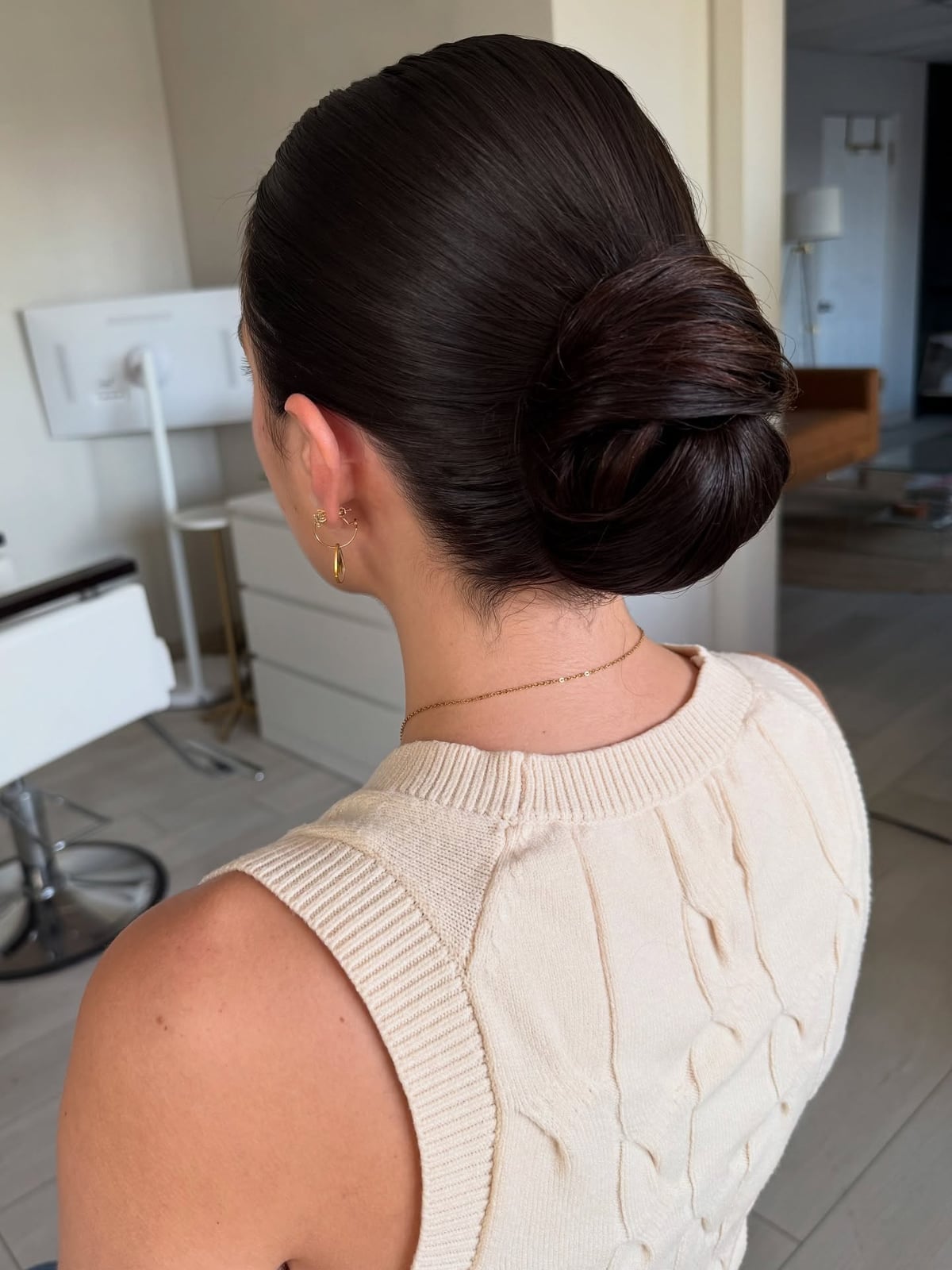 Thick Dark Brown Sleek Low Bun Thick Dark Brown Sleek Low Bun — Classy Professional Hairstyles