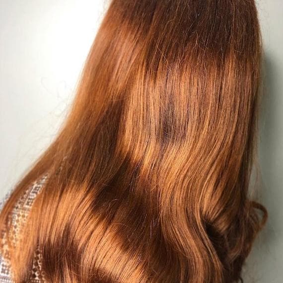 Mid-Back Rich Auburn Glossy Waves — Classy Red Hair Colors