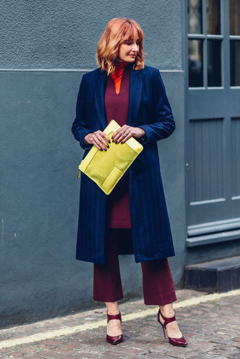 Burgundy Cropped Flared Trousers With Orange Turtleneck Burgundy Cropped Flared Trousers With Orange Turtleneck — Classy Red Pants Outfits