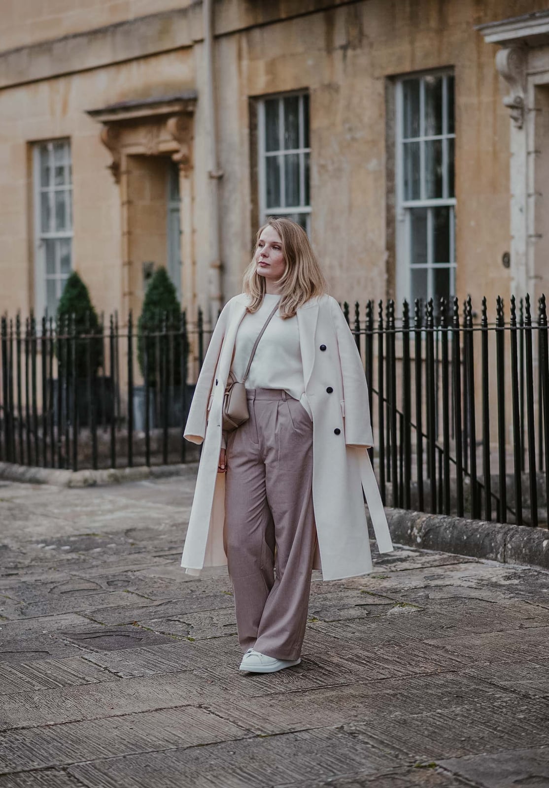 Long Cream Coat Over Wide-Leg Trousers Long Cream Coat Over Wide-Leg Trousers — Classy Restaurant Outfit