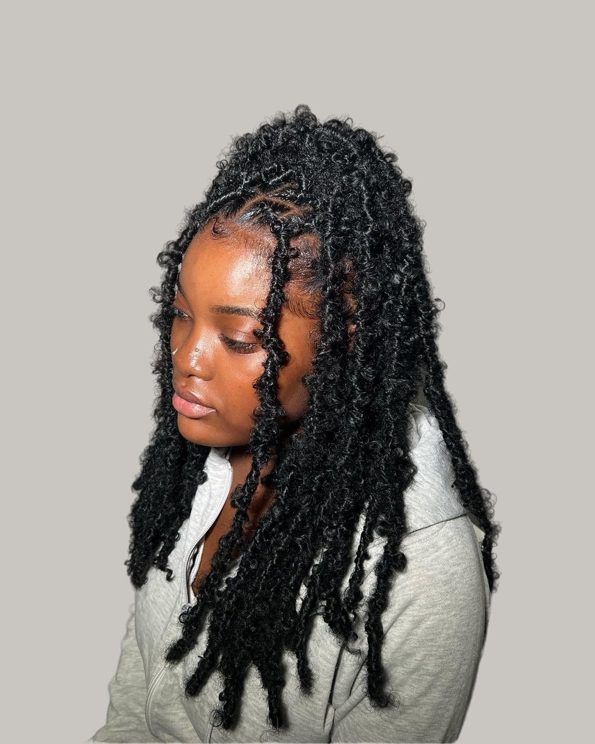 Butterfly Locs Ponytail With Face-Framing Tendrils Butterfly Locs Ponytail With Face-Framing Tendrils — Classy Retwist Locs