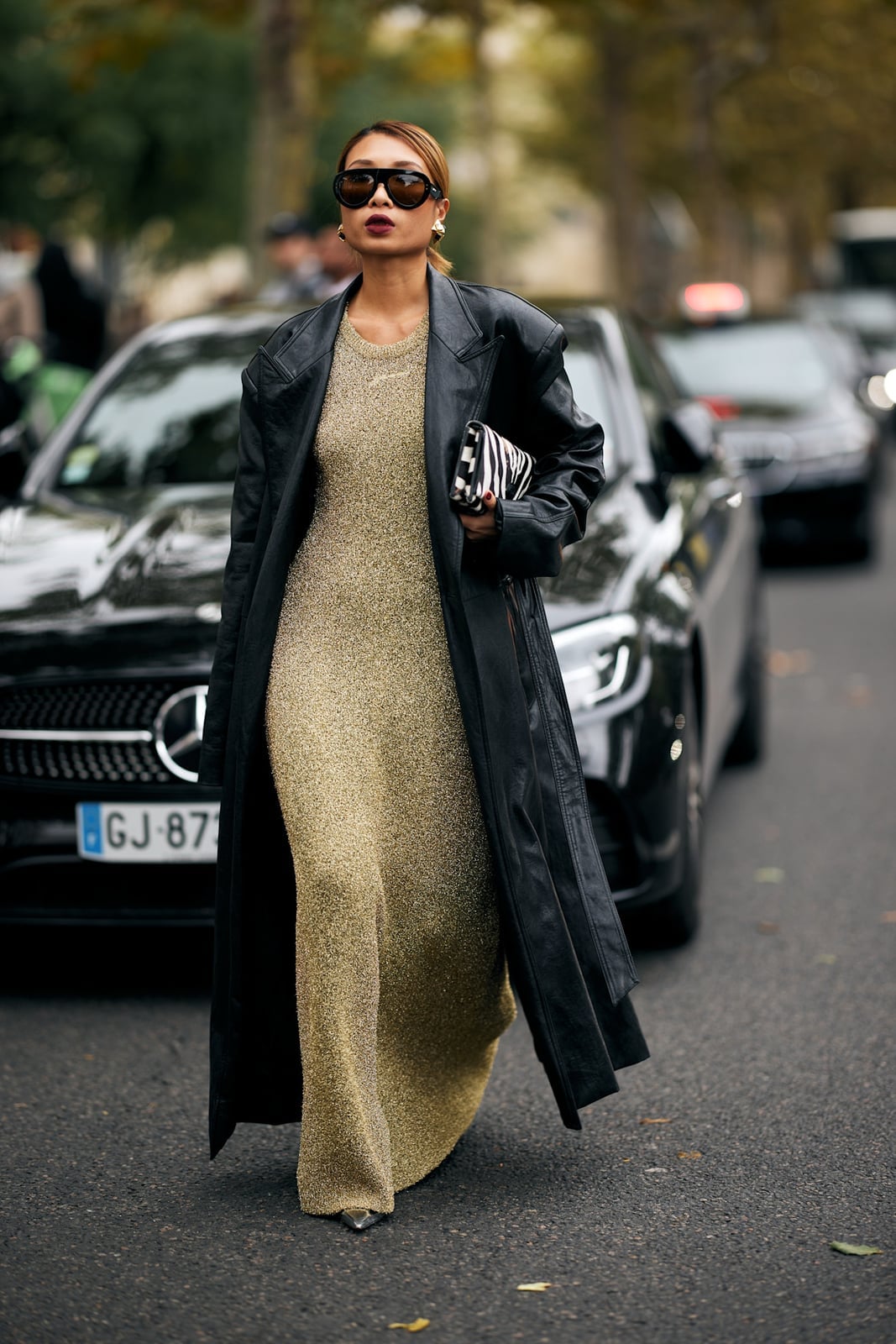 Long Black Leather Coat Over Gold Metallic Knit Dress Long Black Leather Coat Over Gold Metallic Knit Dress — Classy Rich Outfits