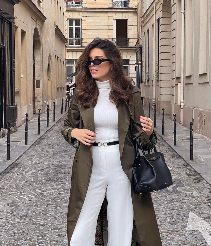 Olive Green Trench Coat Over White Turtleneck and Wide Leg Trousers Olive Green Trench Coat Over White Turtleneck and Wide Leg Trousers — Classy Rich Outfits