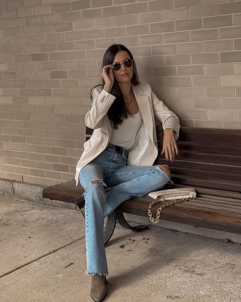 Light Wash Ripped Jeans with Beige Blazer and Ankle, Close-Up Take Light Wash Ripped Jeans with Beige Blazer and Ankle, Close-Up Take — Classy Ripped Jeans Outfits