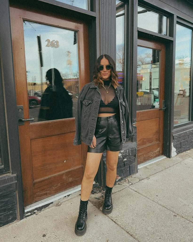 Denim Jacket Over Lace Bra And Faux Leather Shorts — Classy Rock Concert Outfits