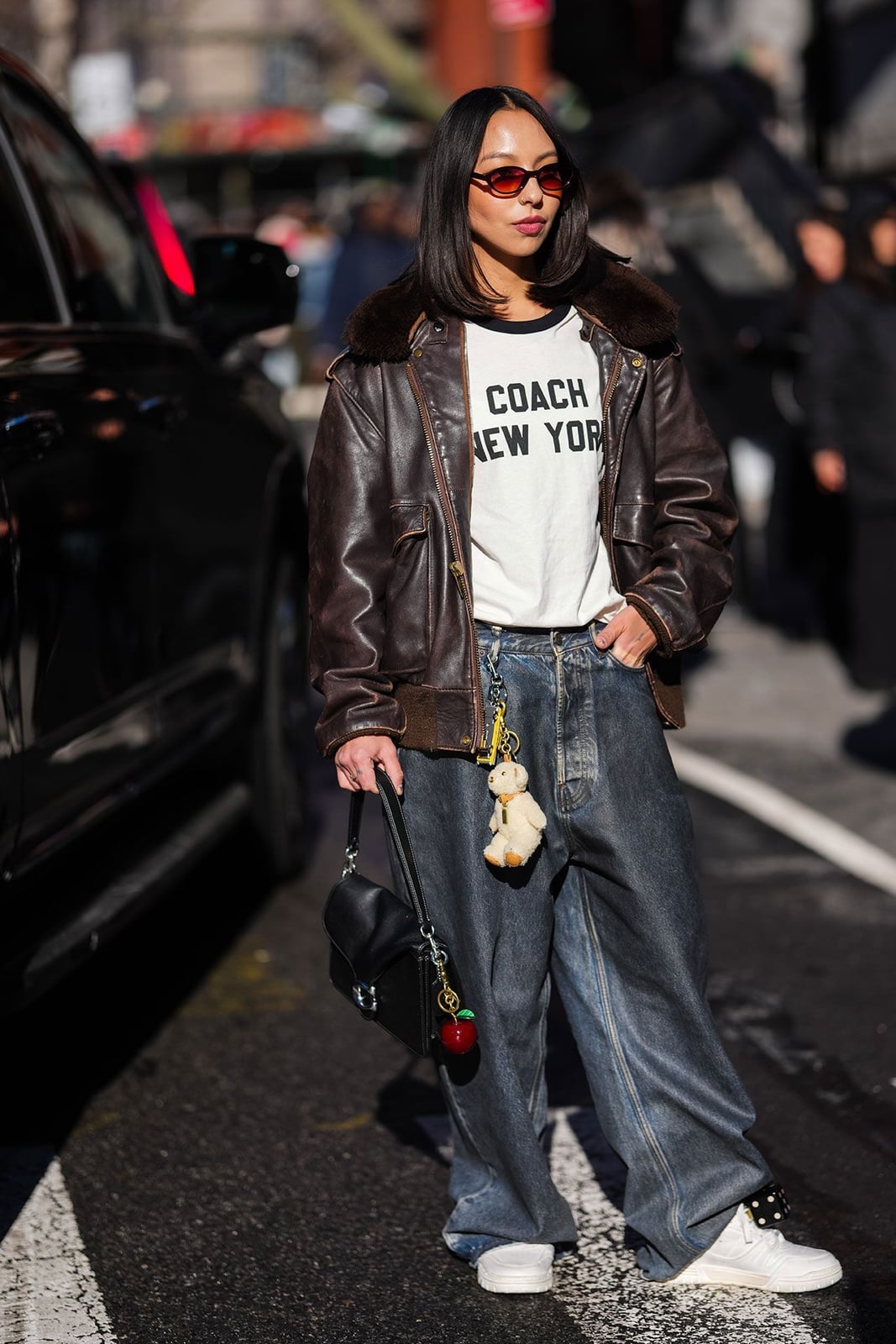 Oversized Leather Bomber Jacket With Graphic Tee — Classy Rock Concert Outfits