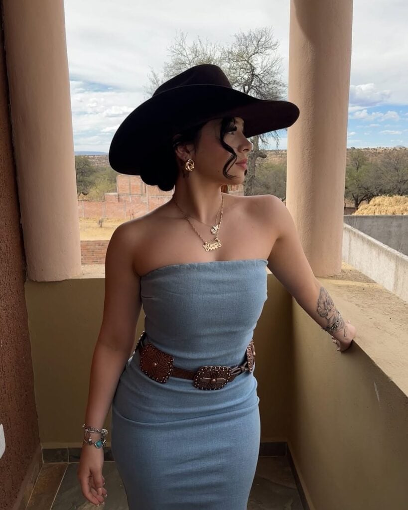 Light Blue Strapless Denim Dress with a Studded Belt and Wide Brim Hat Light Blue Strapless Denim Dress with a Studded Belt and Wide Brim Hat — Classy Rodeo Outfits for Women