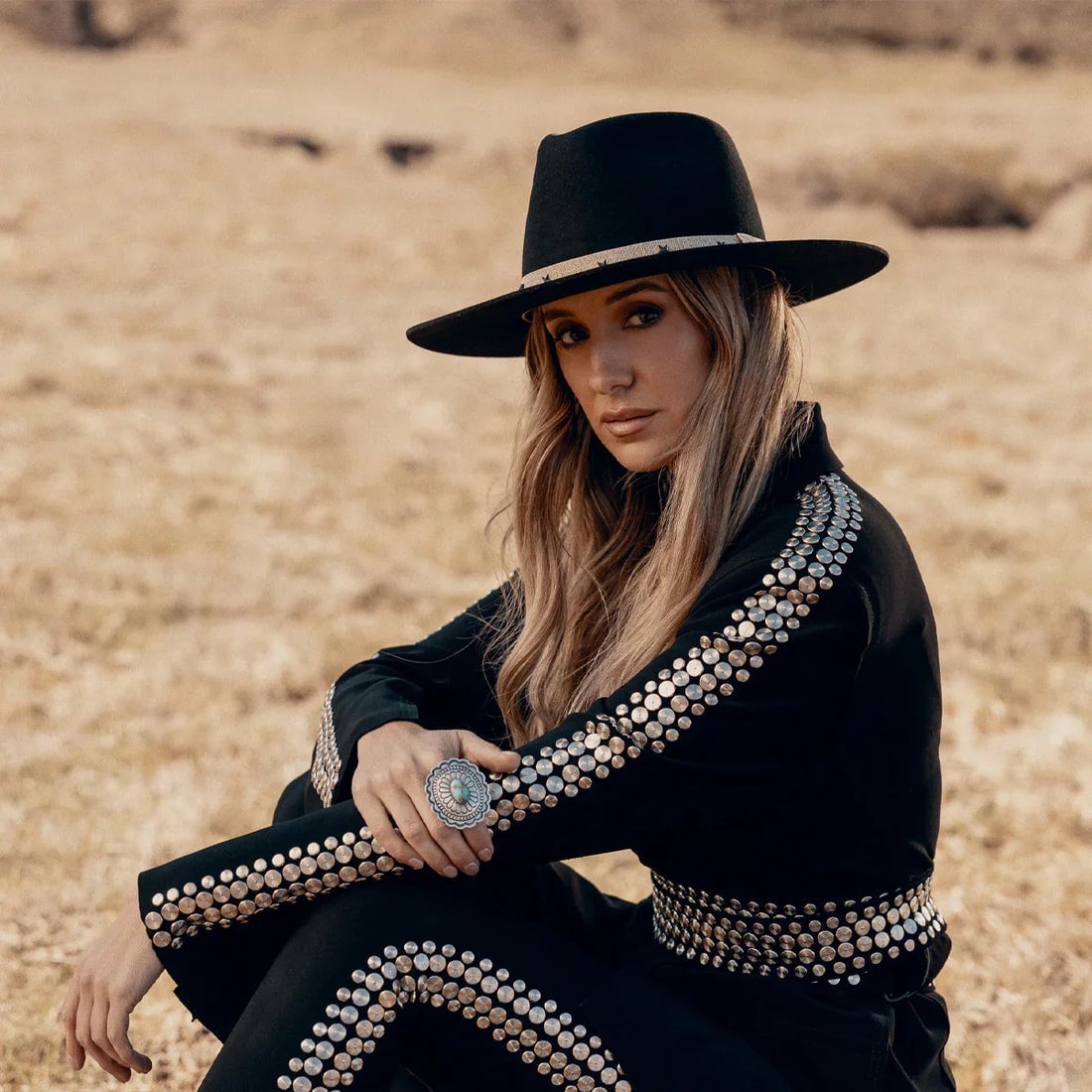 Black Long-Sleeved Shirt with Silver Studding Creates a Bold Statement Black Long-Sleeved Shirt with Silver Studding Creates a Bold Statement — Classy Rodeo Outfits for Women
