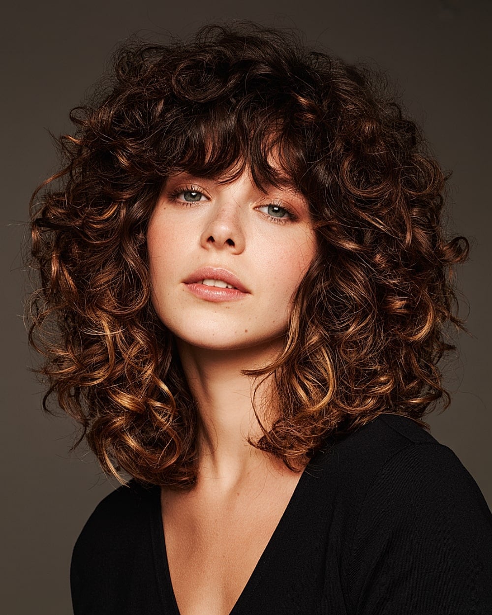 Collarbone Dark Brown Shag With Curly Bangs, Middle Collarbone Dark Brown Shag With Curly Bangs, Middle — Classy Shag Hair