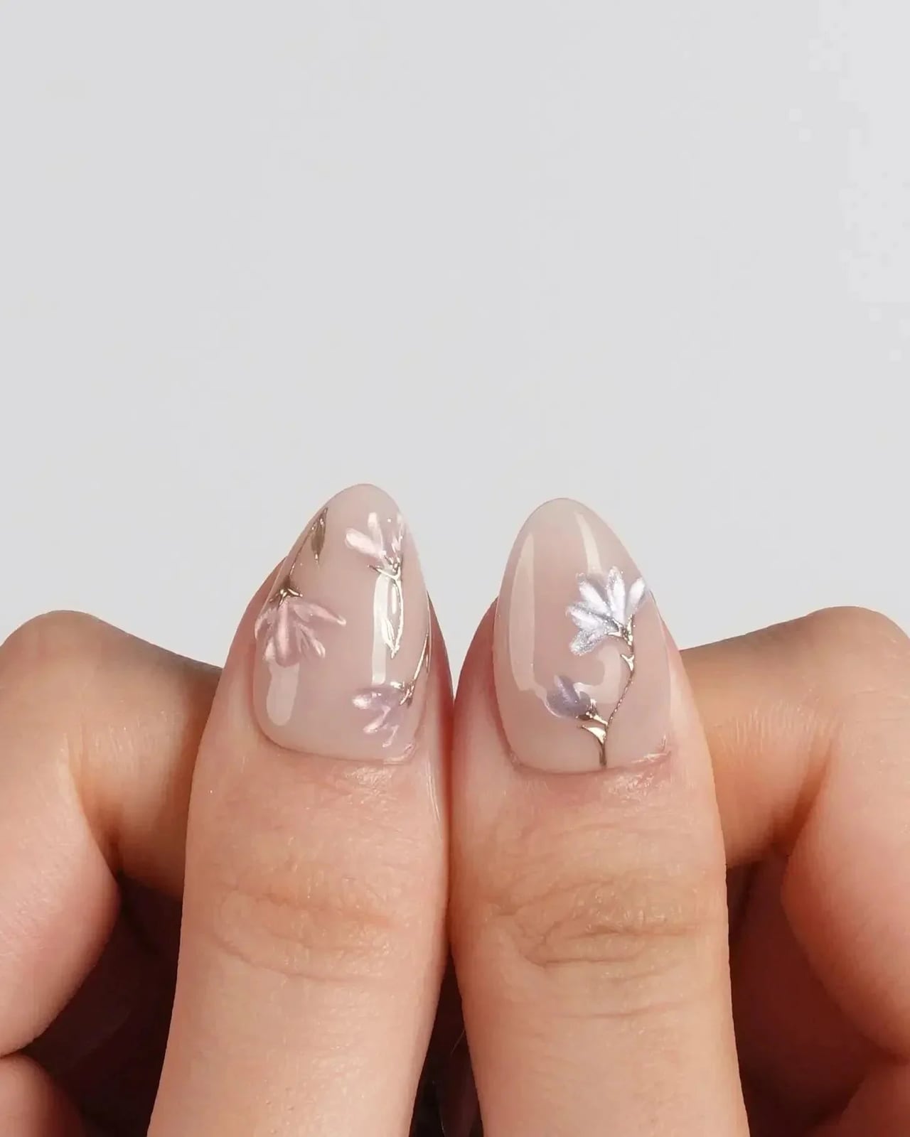 Medium Almond Sheer Nude Floral Motifs Medium Almond Sheer Nude Floral Motifs — Classy Sheer Nails
