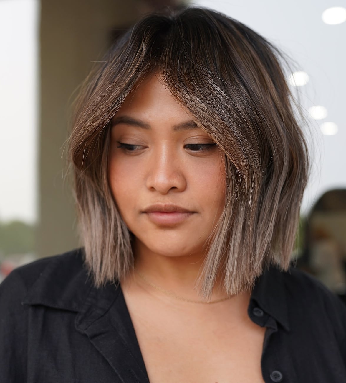 Sleek Chin Bob Gray Tones Side Part Sleek Chin Bob Gray Tones Side Part — Classy Short Haircuts for Round Faces
