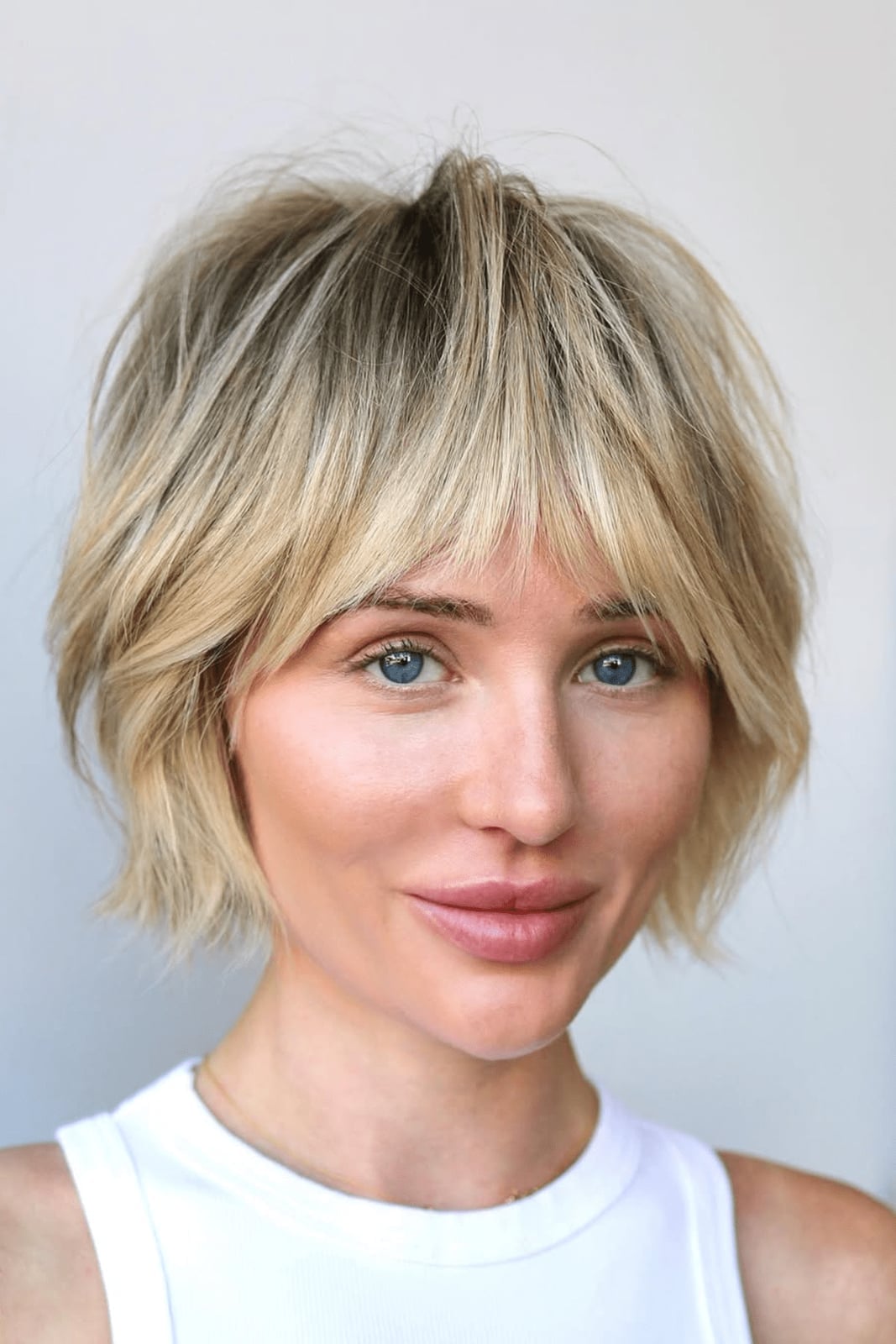 Ash Blonde Shag With Face-Framing Layers Ash Blonde Shag With Face-Framing Layers — Classy Short Shaggy Haircut