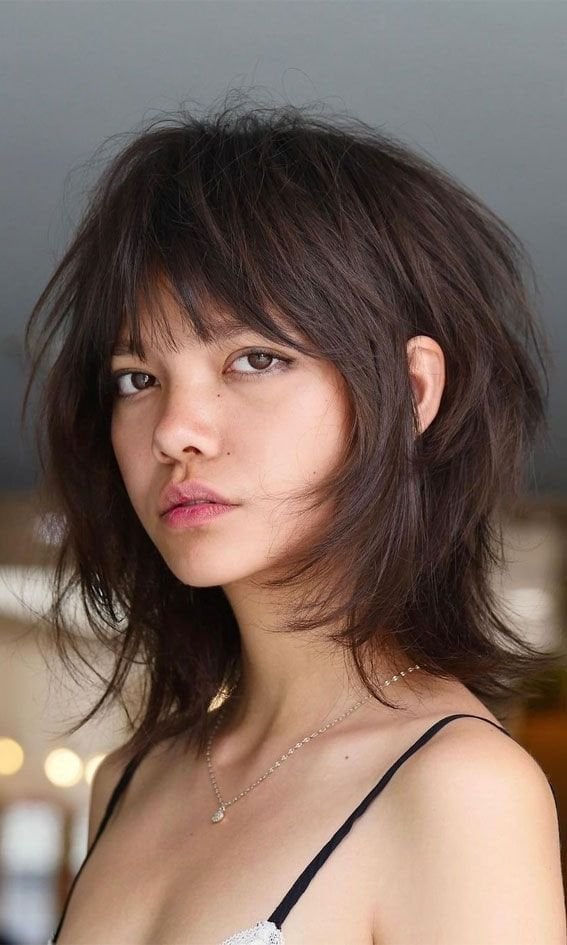 Dark Brown Shag With Curtain Bangs And Face-Framing Layers Dark Brown Shag With Curtain Bangs And Face-Framing Layers — Classy Short Shaggy Haircut