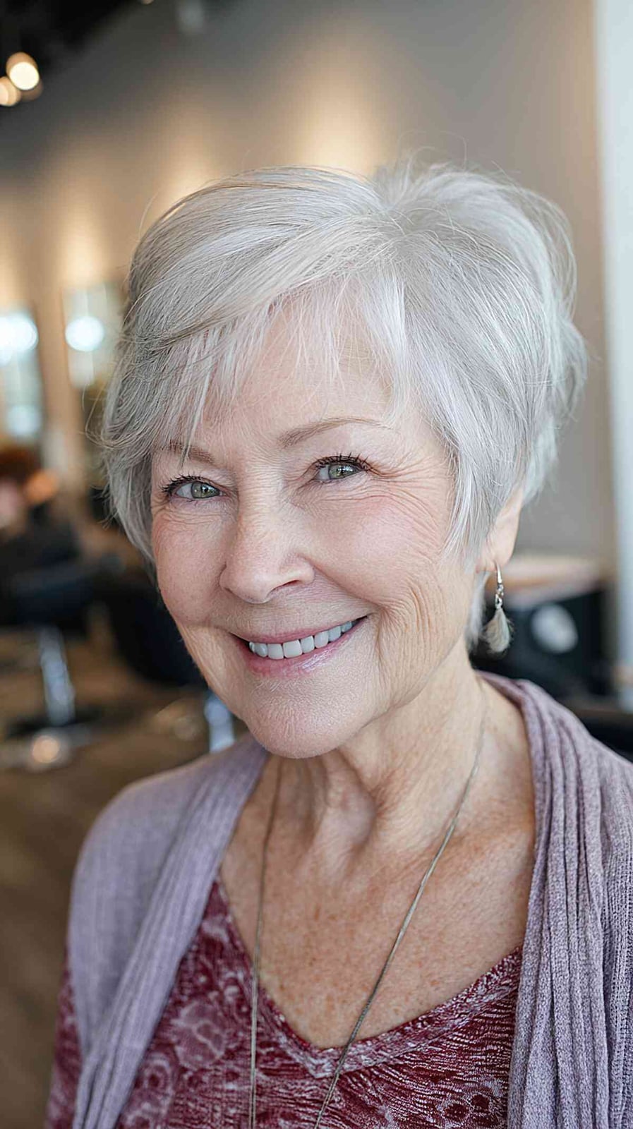 Gray Pixie Bob With Side-Swept Bangs Gray Pixie Bob With Side-Swept Bangs — Classy Short Shaggy Haircut