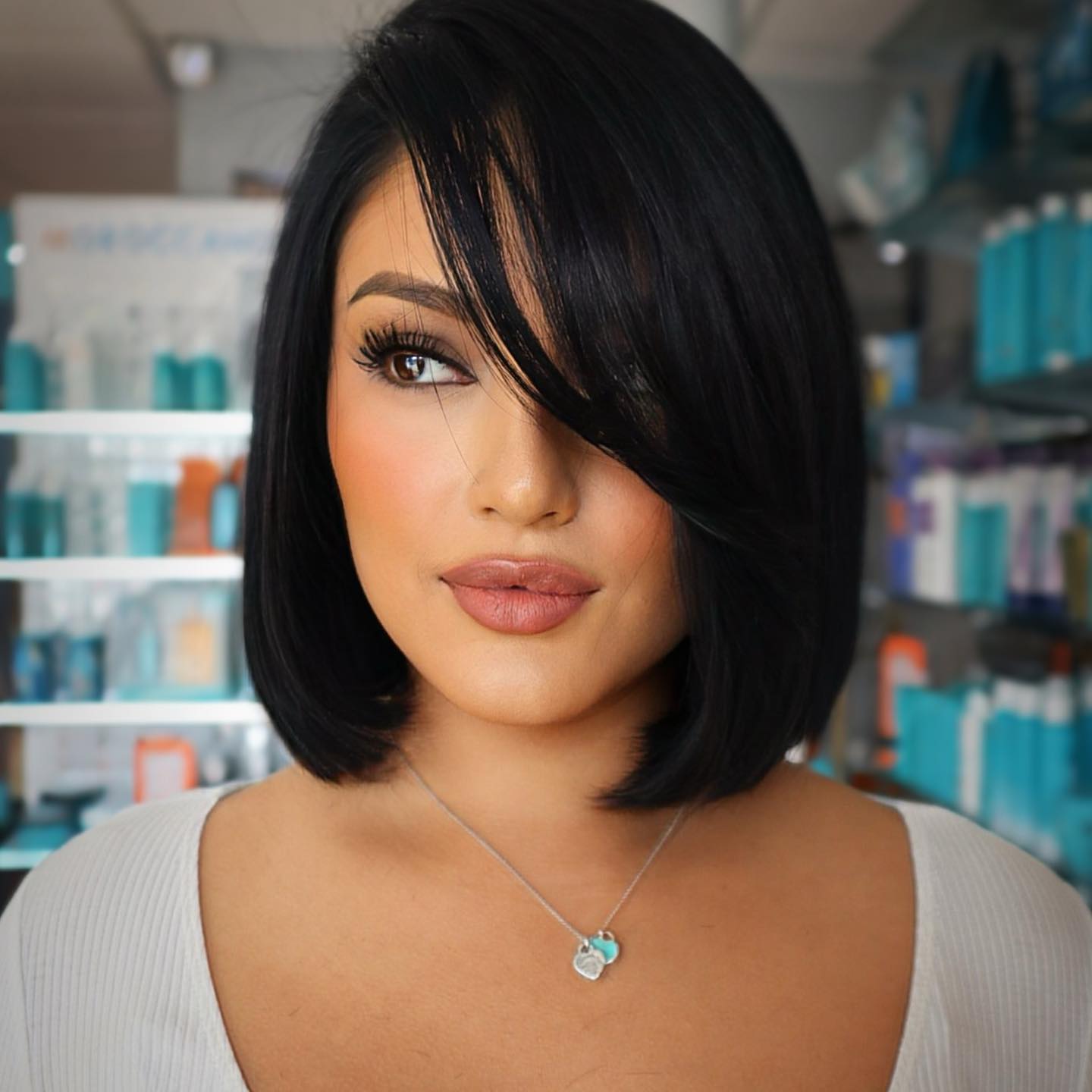Sleek Black Bob With Sharp Side Swept Bangs Sleek Black Bob With Sharp Side Swept Bangs — Classy Side Part Bangs