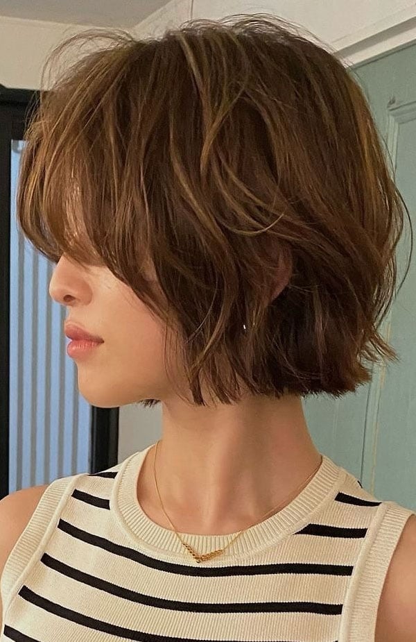 Layered Medium Brown Bob With Textured Waves Layered Medium Brown Bob With Textured Waves — Classy Side Part Bangs