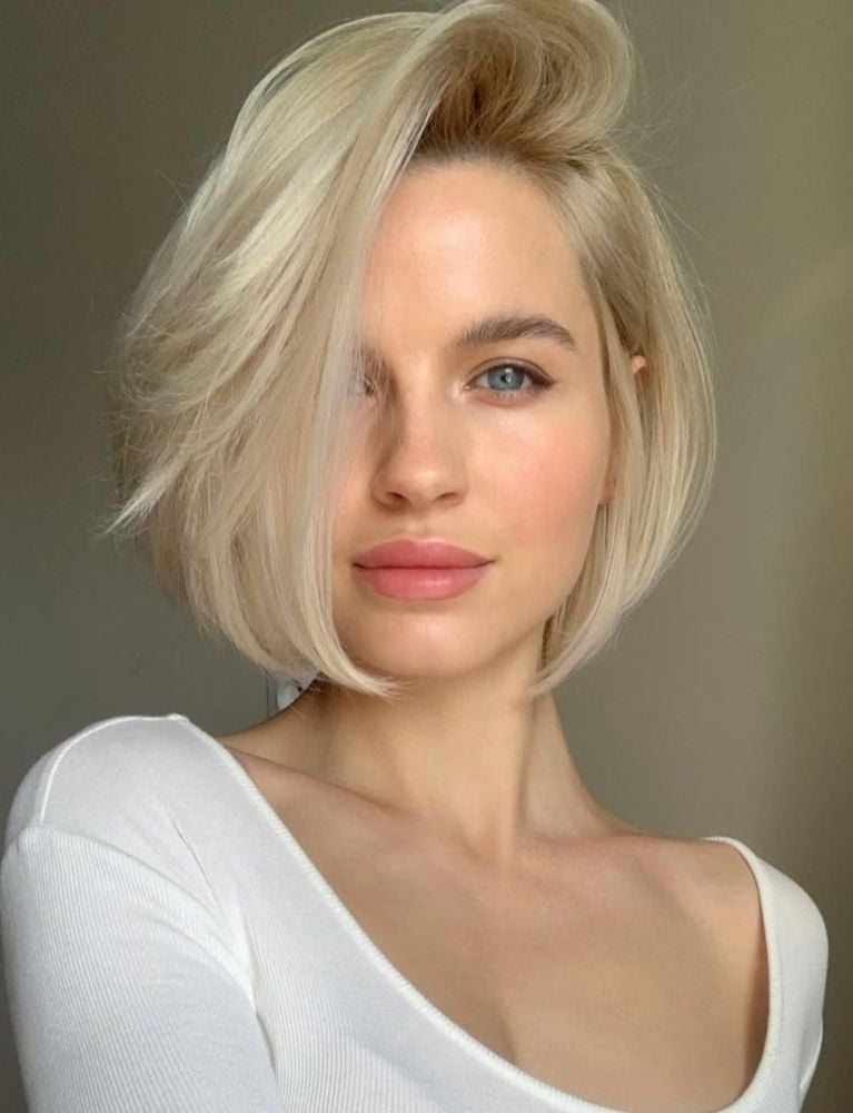 Chin Length Angled Bob Platinum Blonde Chin Length Angled Bob Platinum Blonde — Classy Side Part Bob