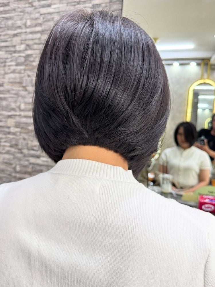 Stacked Dark Brown Bob Back View Stacked Dark Brown Bob Back View — Classy Side Part Bob