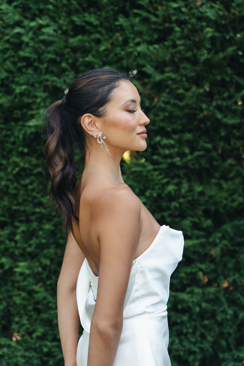 Low Side Ponytail With Subtle Layers — Classy Side Part Ponytail