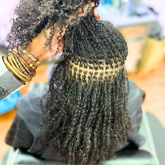 Shoulder Length Chic Bun With Loose Strands Shoulder Length Chic Bun With Loose Strands — Classy Sister Locs