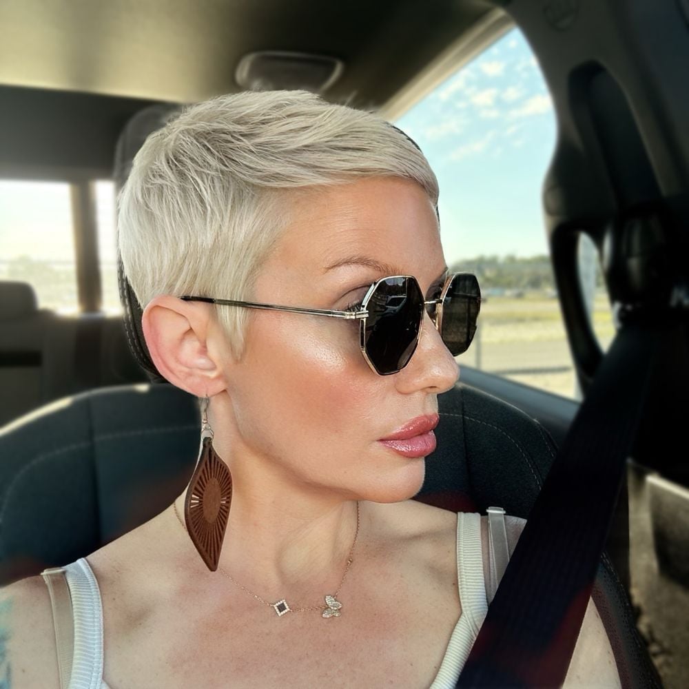 Light Blonde Pixie With Long Bangs Light Blonde Pixie With Long Bangs — Classy Textured Pixie
