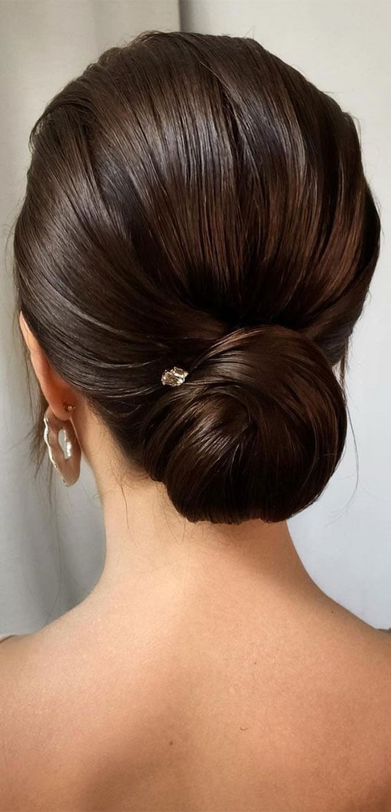 Elegant Dark Brown Low Bun Elegant Dark Brown Low Bun — Classy Trending Hairstyle