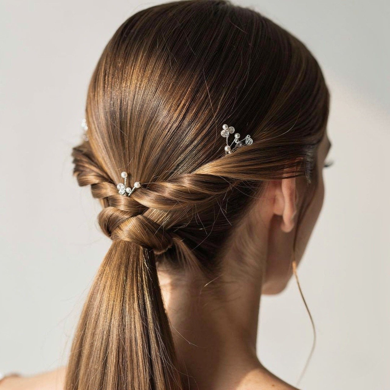 Medium Brown Ponytail With Twisted Detail Medium Brown Ponytail With Twisted Detail — Classy Updo Ponytail