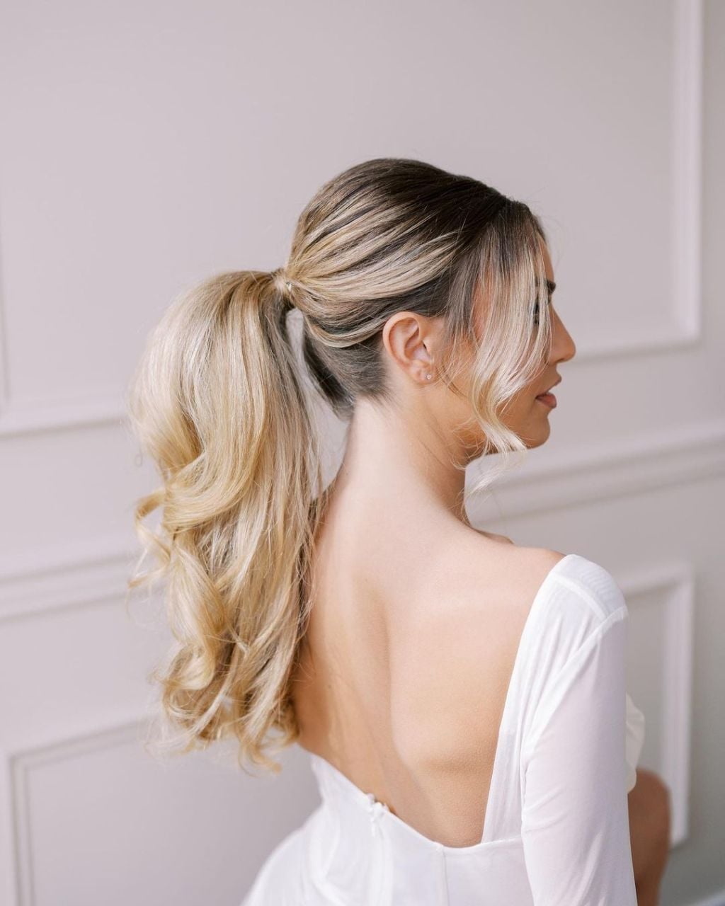 Light Blonde High Ponytail With Loose Waves Light Blonde High Ponytail With Loose Waves — Classy Updo Ponytail